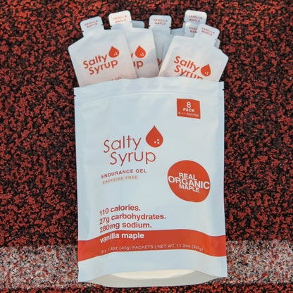 Salty Syrup OG single gel packet on running track